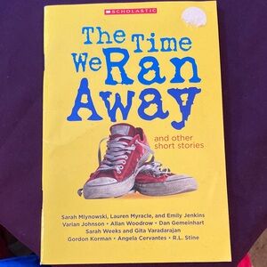 Scholastic Yellow Book with Red and Blue Sneakers